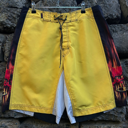 Yellow and white Y2K Oakley with flames 