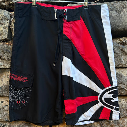Andy irons style billabong black and red boardshorts rising sun 